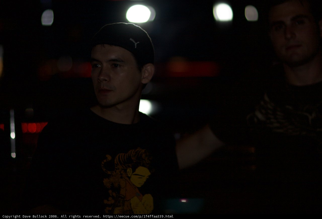 Two Men in a Dark Room