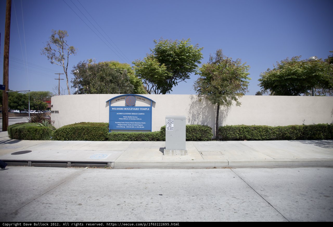 Blue Sign on Blue Pole