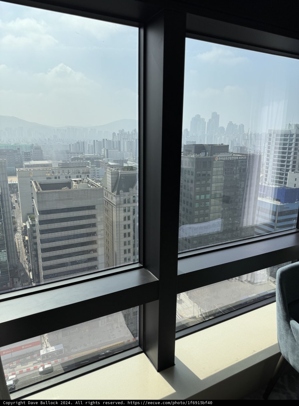 Urban View: Cityscape Through the Window