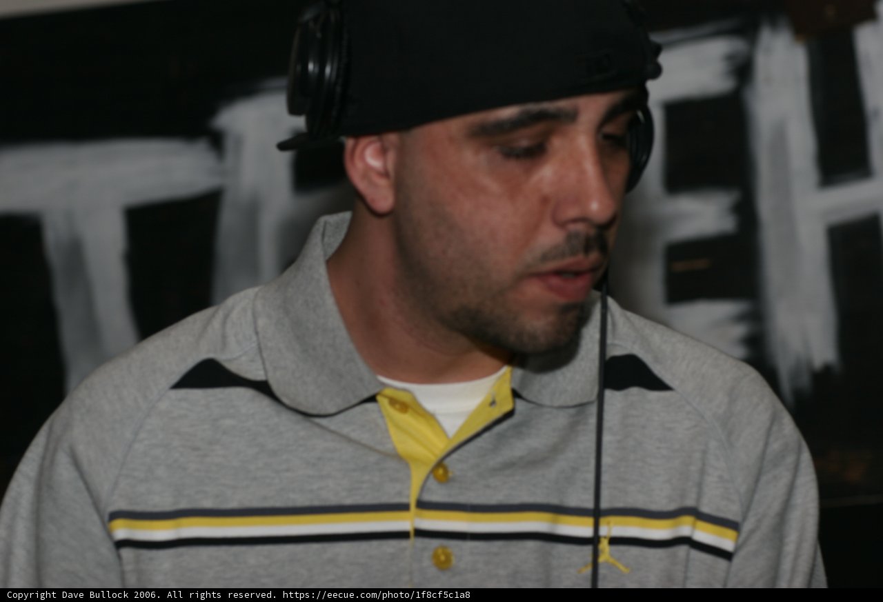Eric S in his favorite headphones and cap
