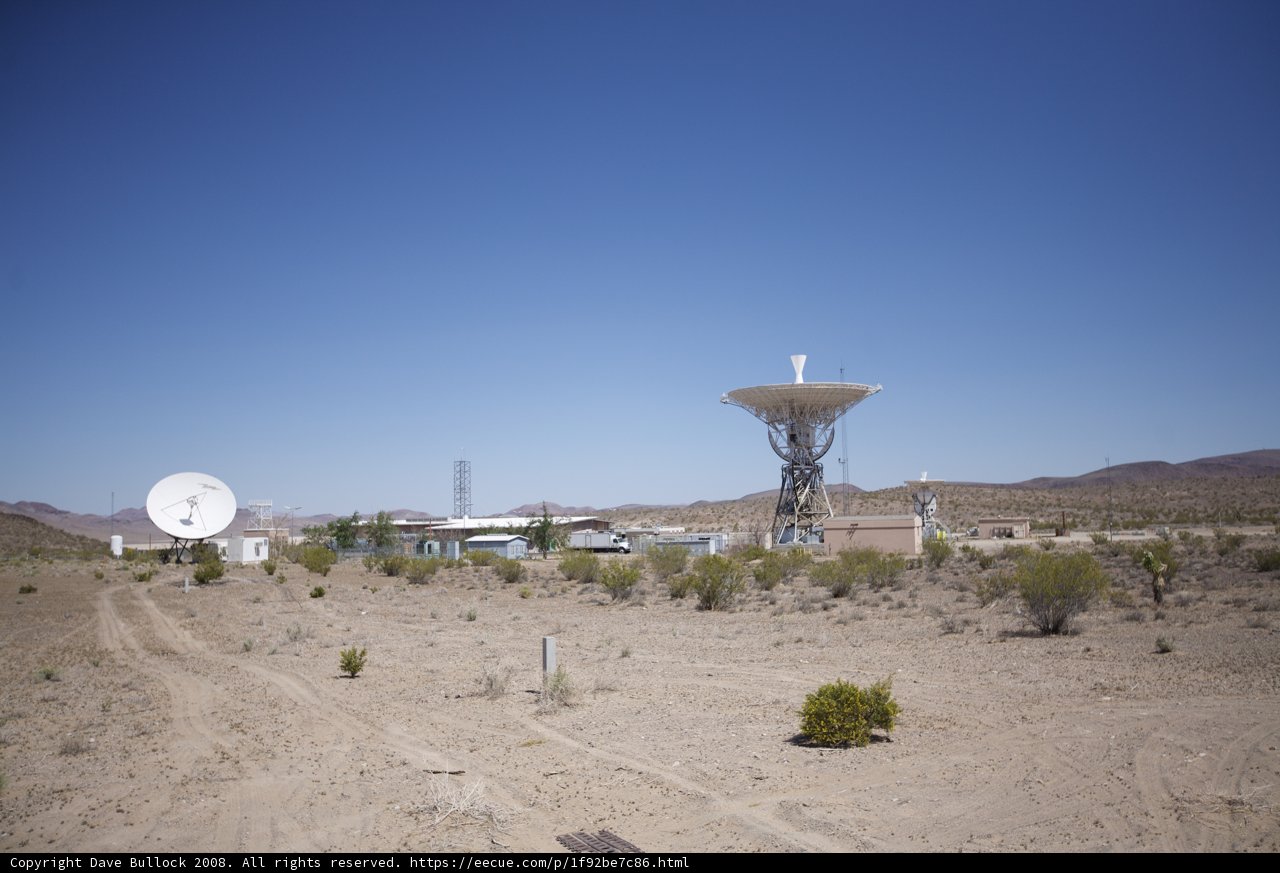 Radio Telescope and Antenna Tower in the Desert