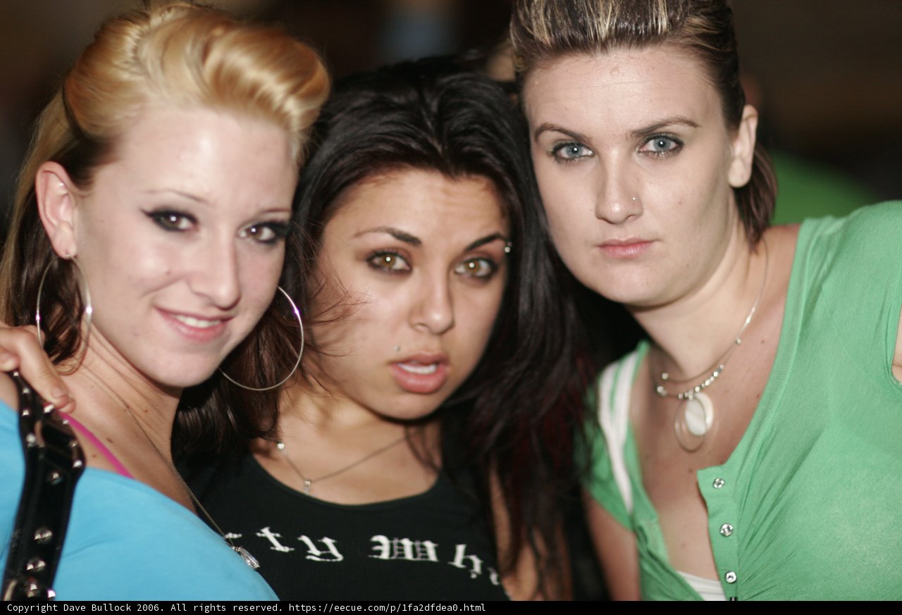 Green-Shirted Woman in the Club
