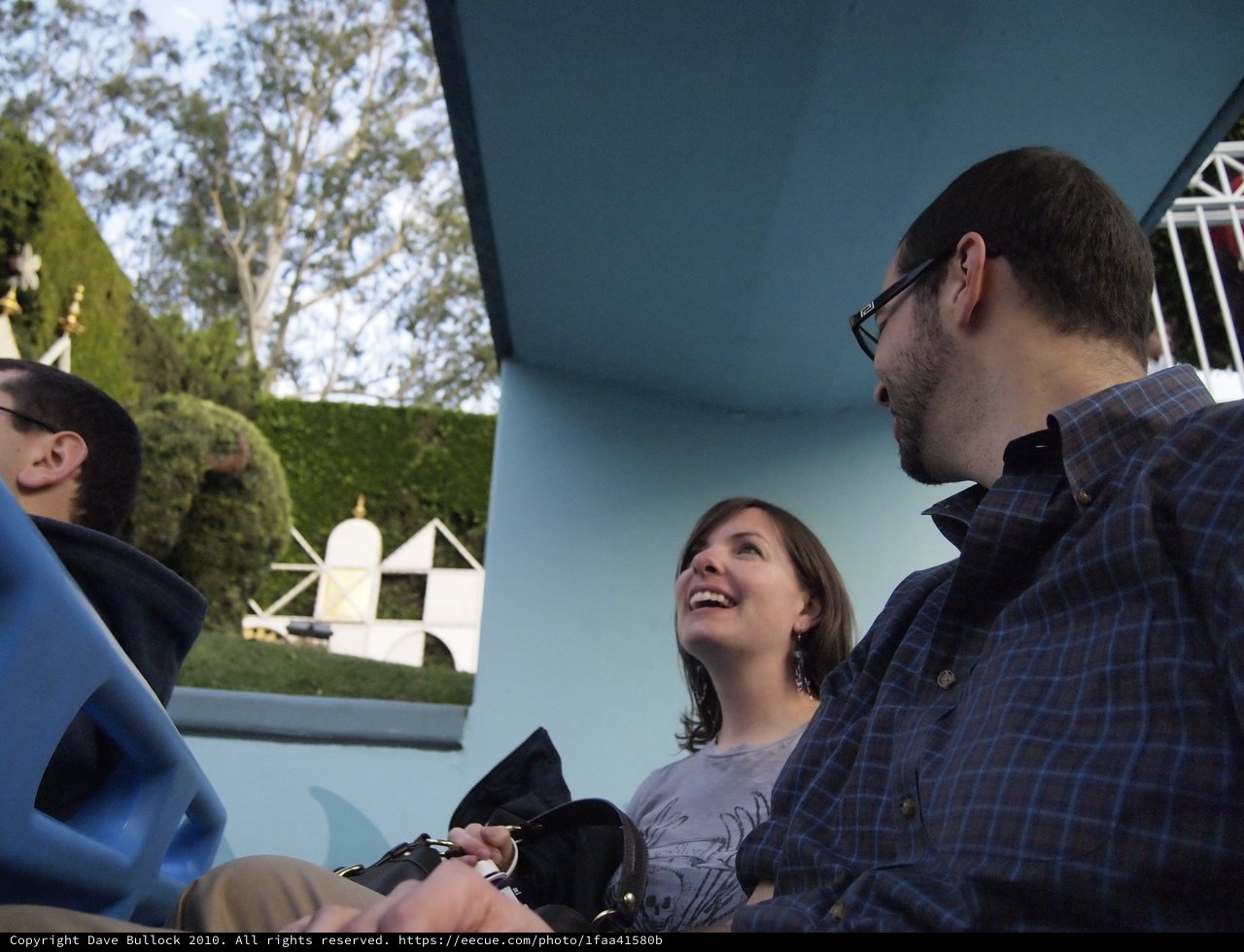 Friends Laughing Together on a Theme Park Ride