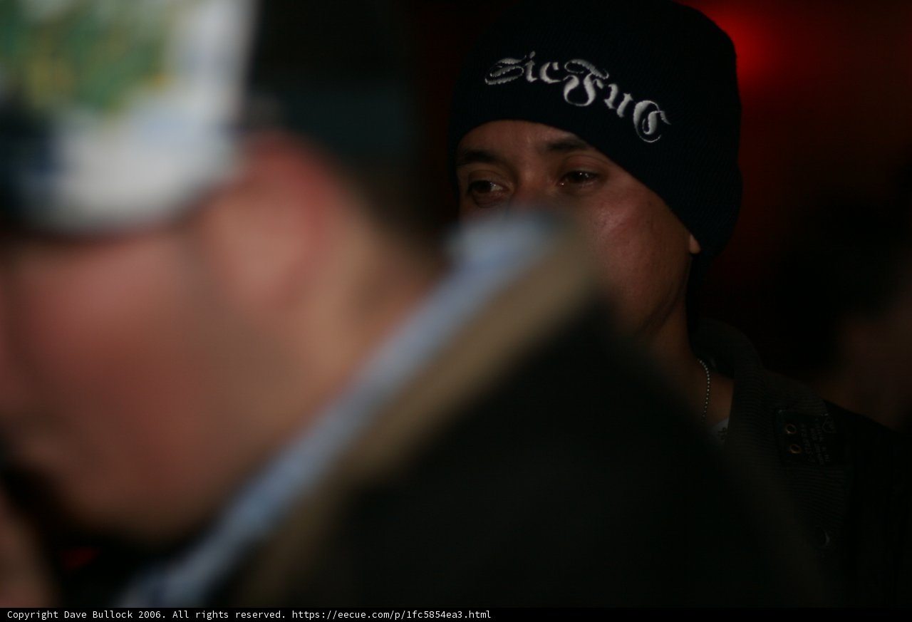 Man in Hat and Black Jacket