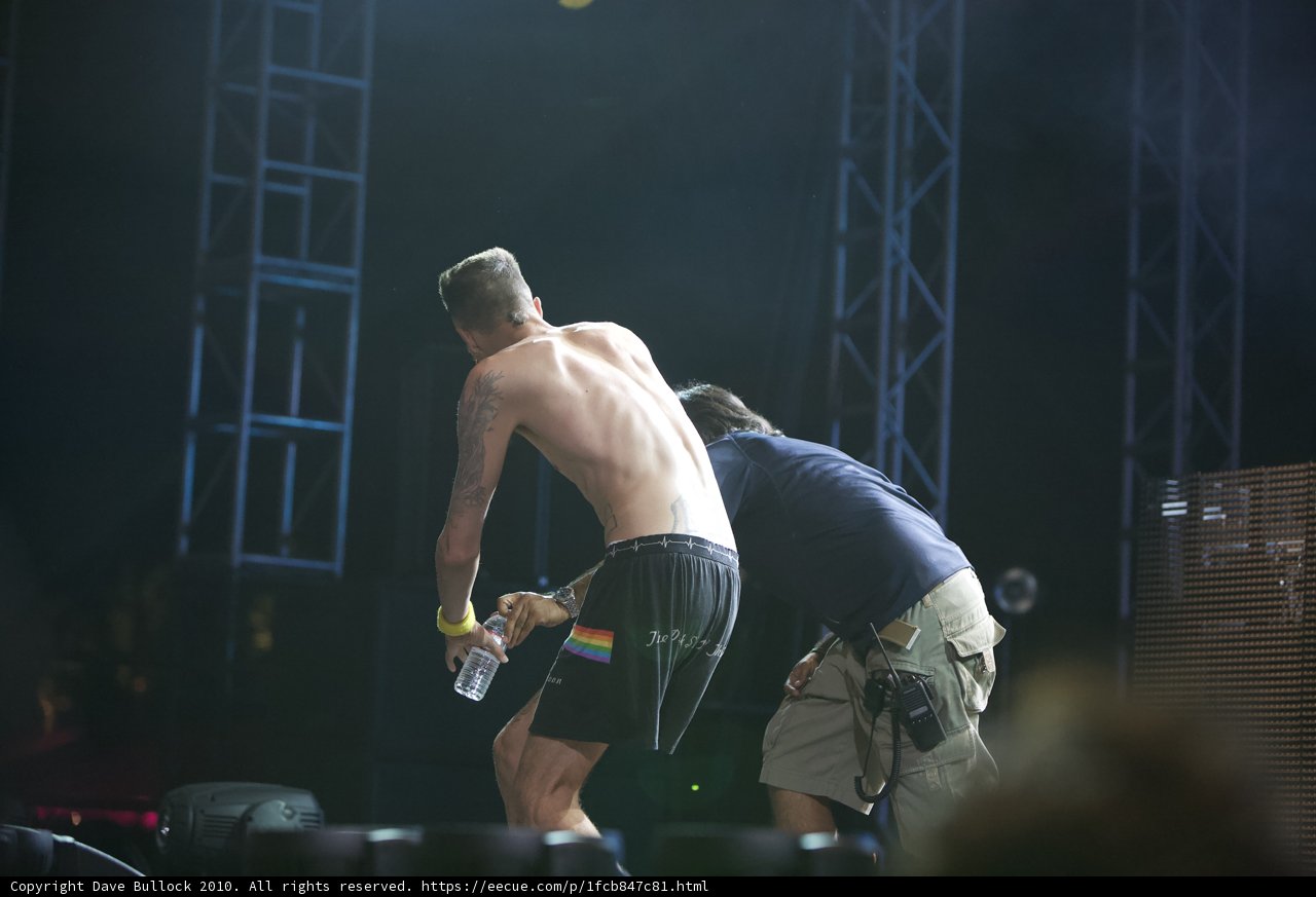 Shirtless Soloist on Stage