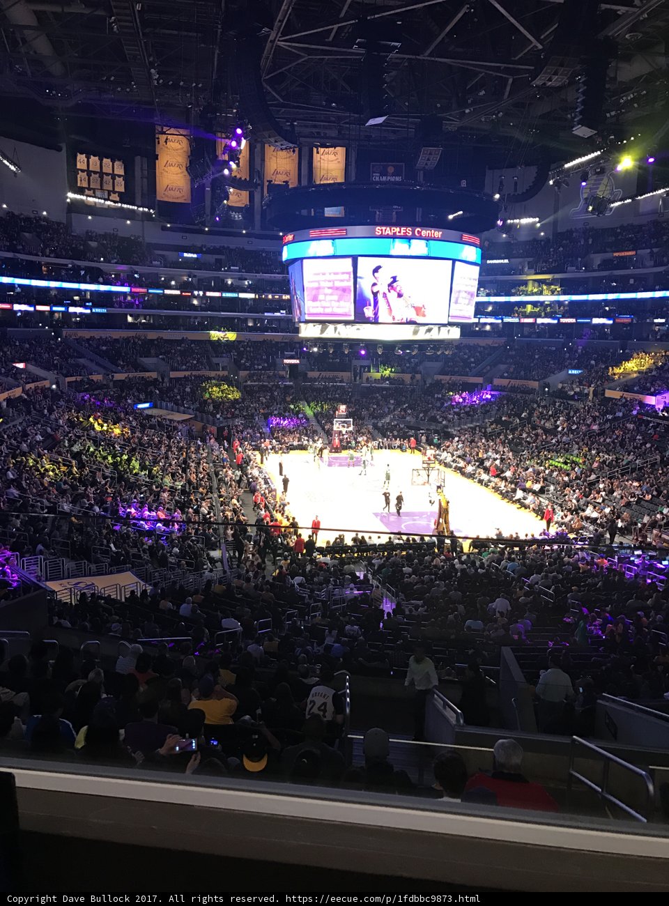 Thrilling Basketball Game in a Packed Arena