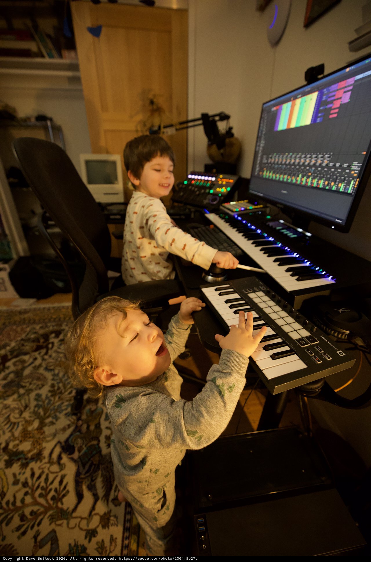 Young Brothers Making Music Together in Home Studio