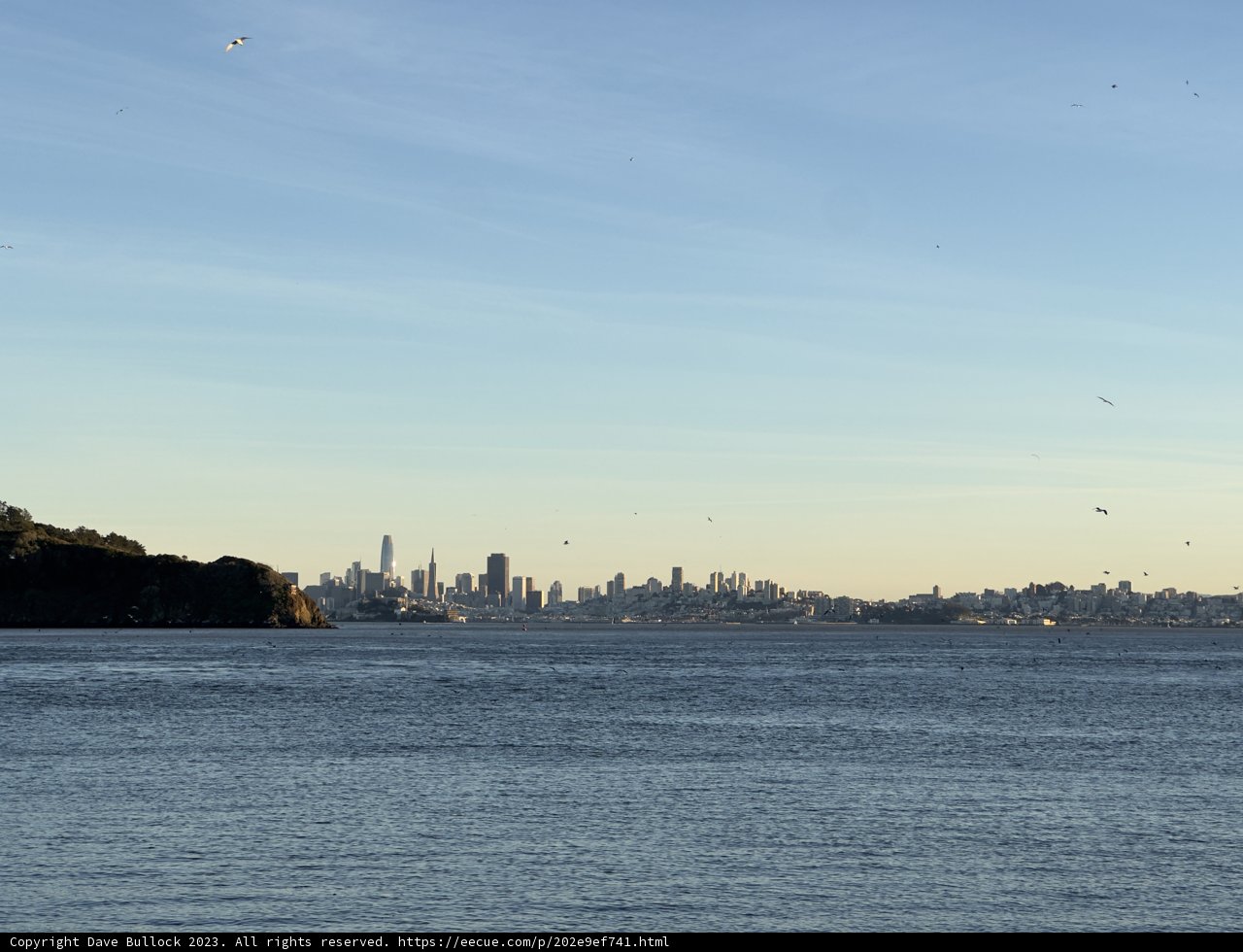 Majestic Cityscape and Tranquil Lake at Point Tiberon Shoreline