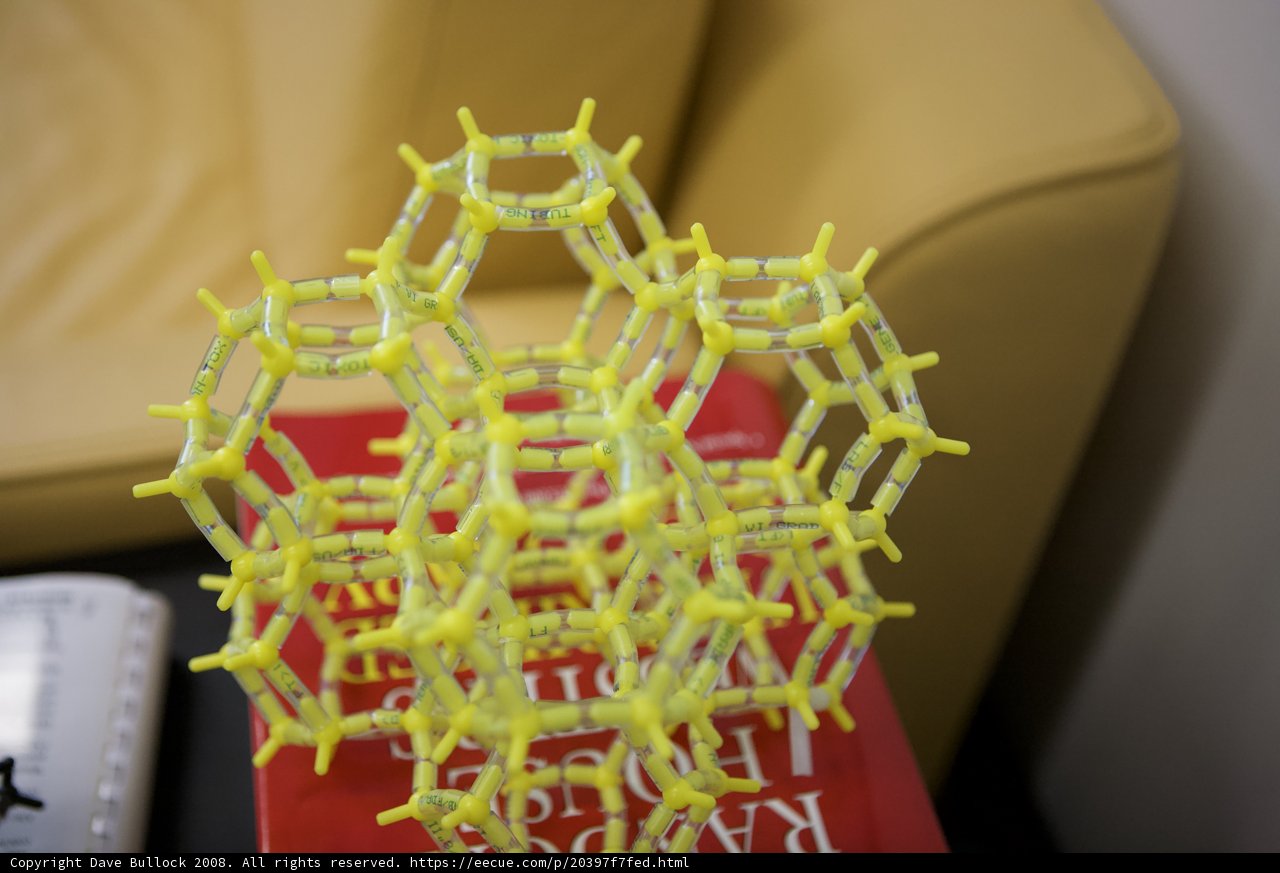 Molecular Model Resting on Top of a Book