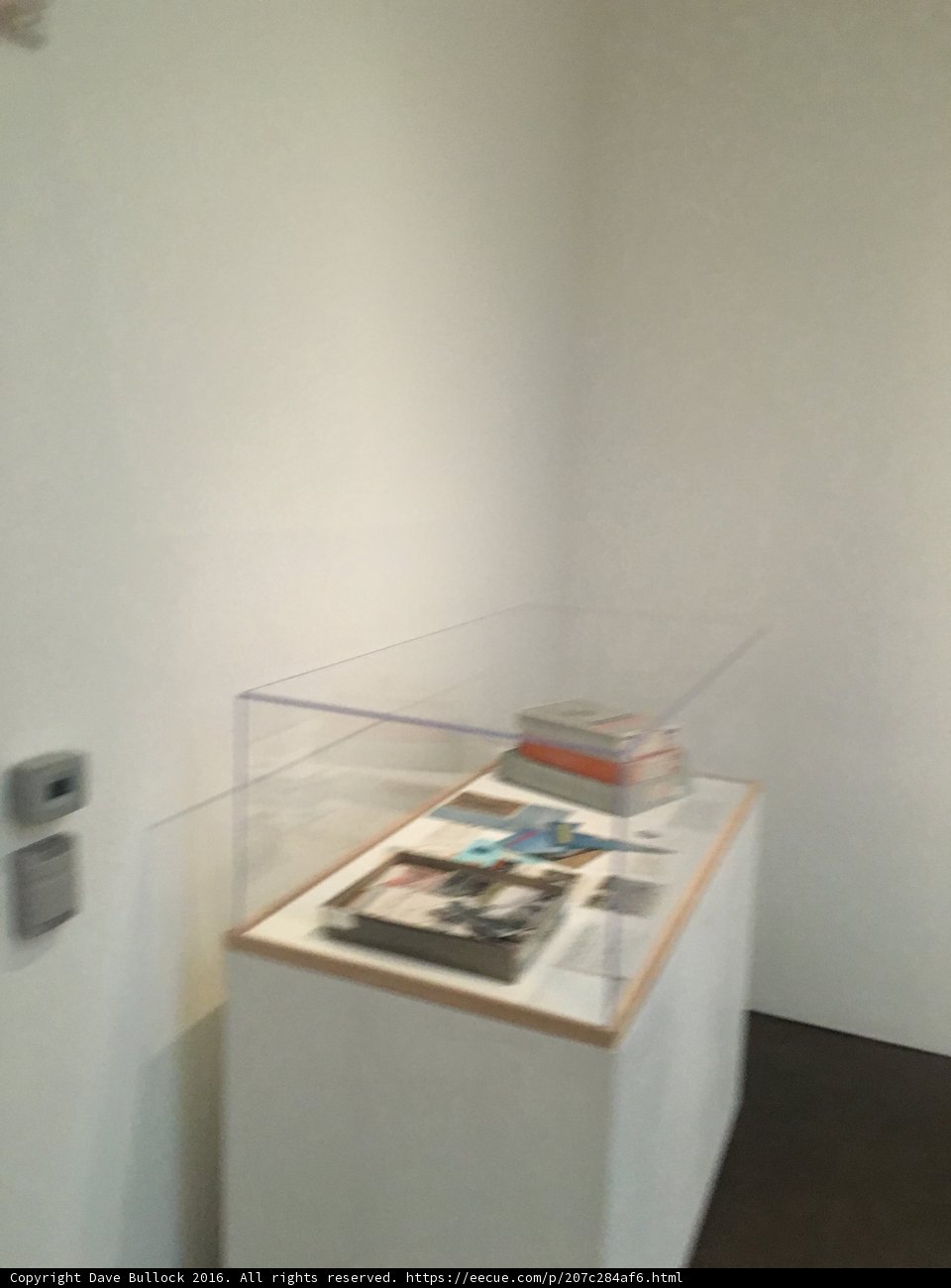 Minimalistic display case with a book
