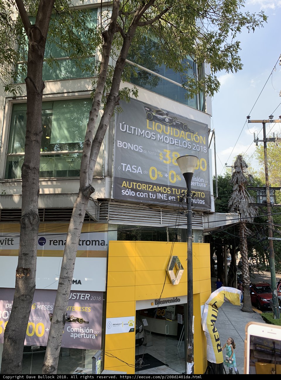 Giant Yellow Advertisement Sign on a Building
