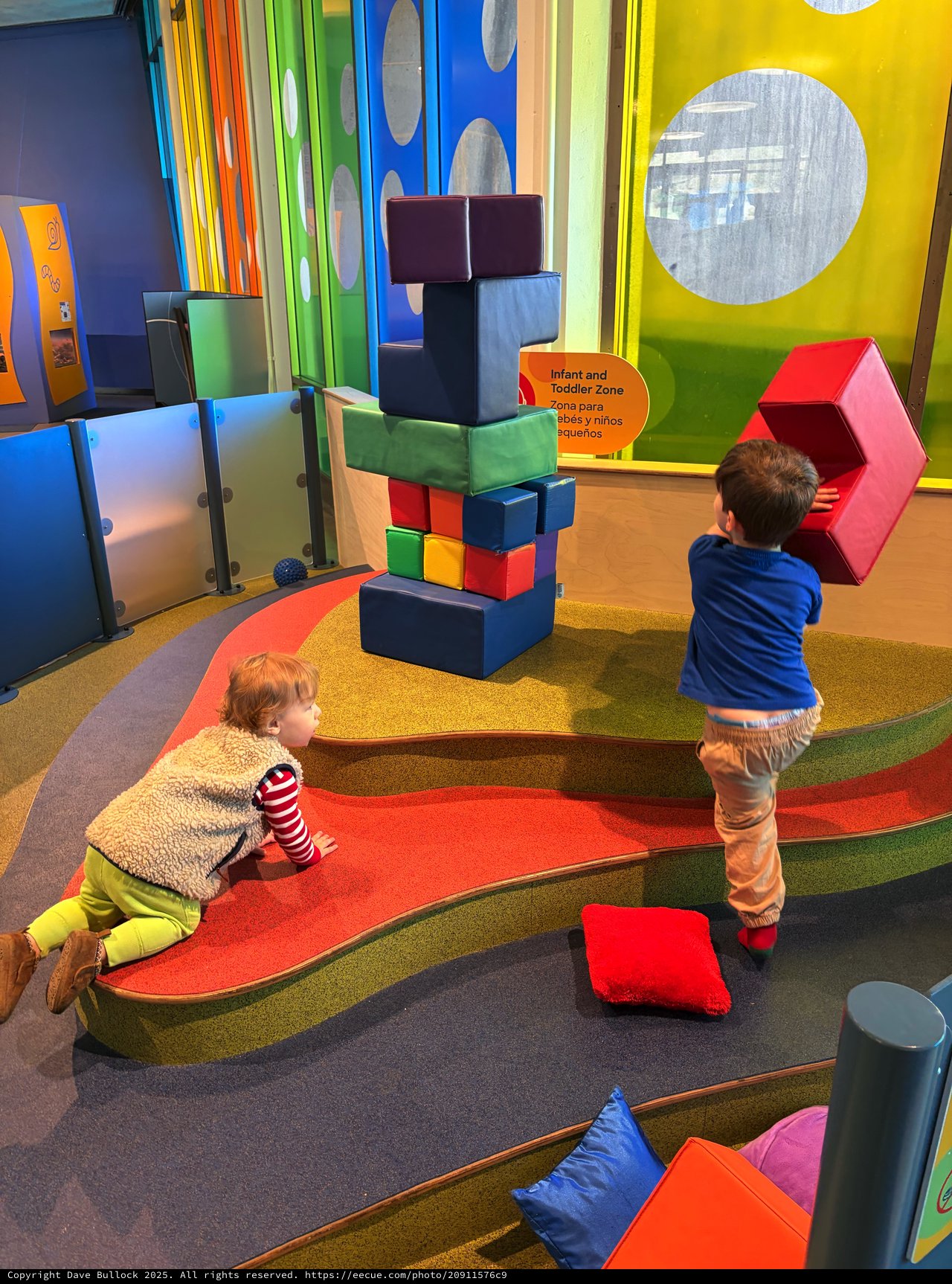 Children Playing with Giant Building Blocks in Museum Play Area