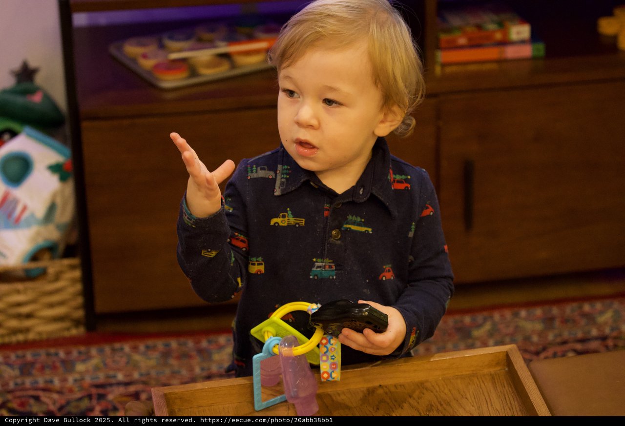 Toddler Playing with Toy Cars at Christmas Time