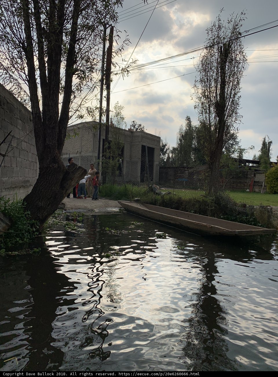 Boat Parked by Canal Building