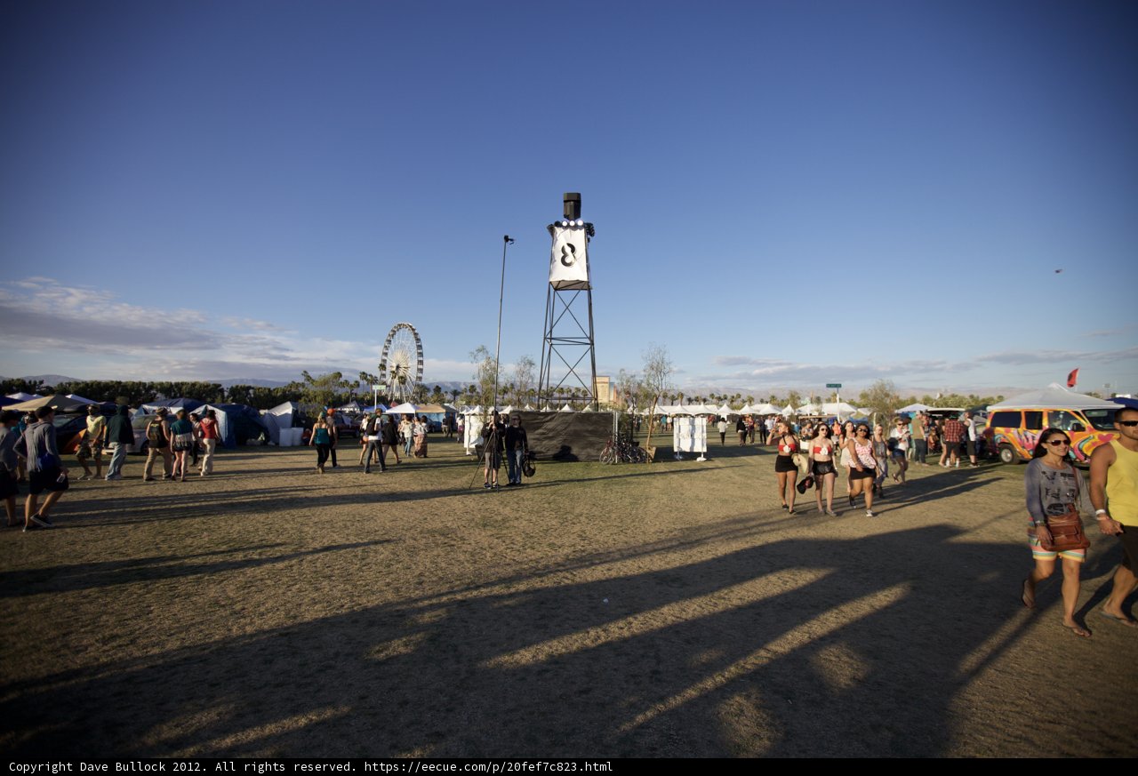 A Festive Crowd with a Clock Tower Backdrop