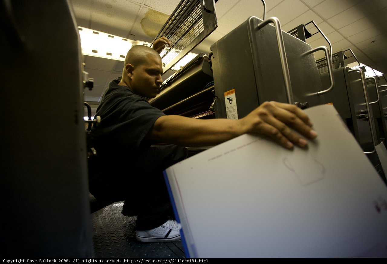 Man on a Train Working on Laptop