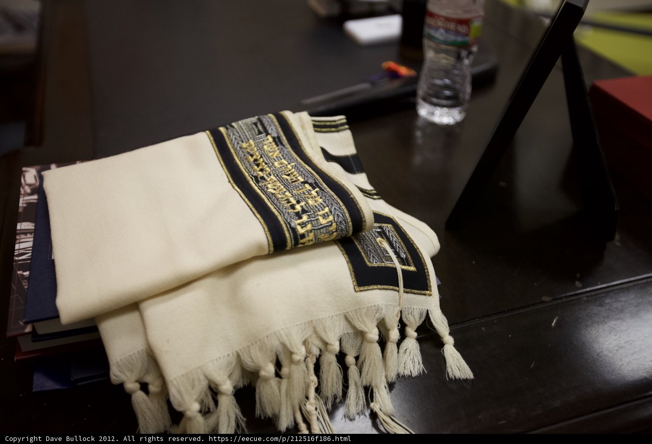 Elegant White Scarf with Gold and Black Writing