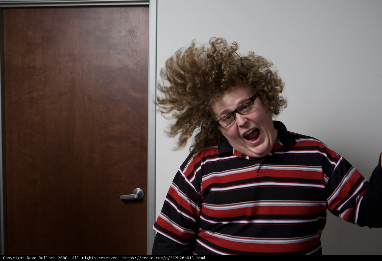 Curly-Haired Gentleman at the APC Office