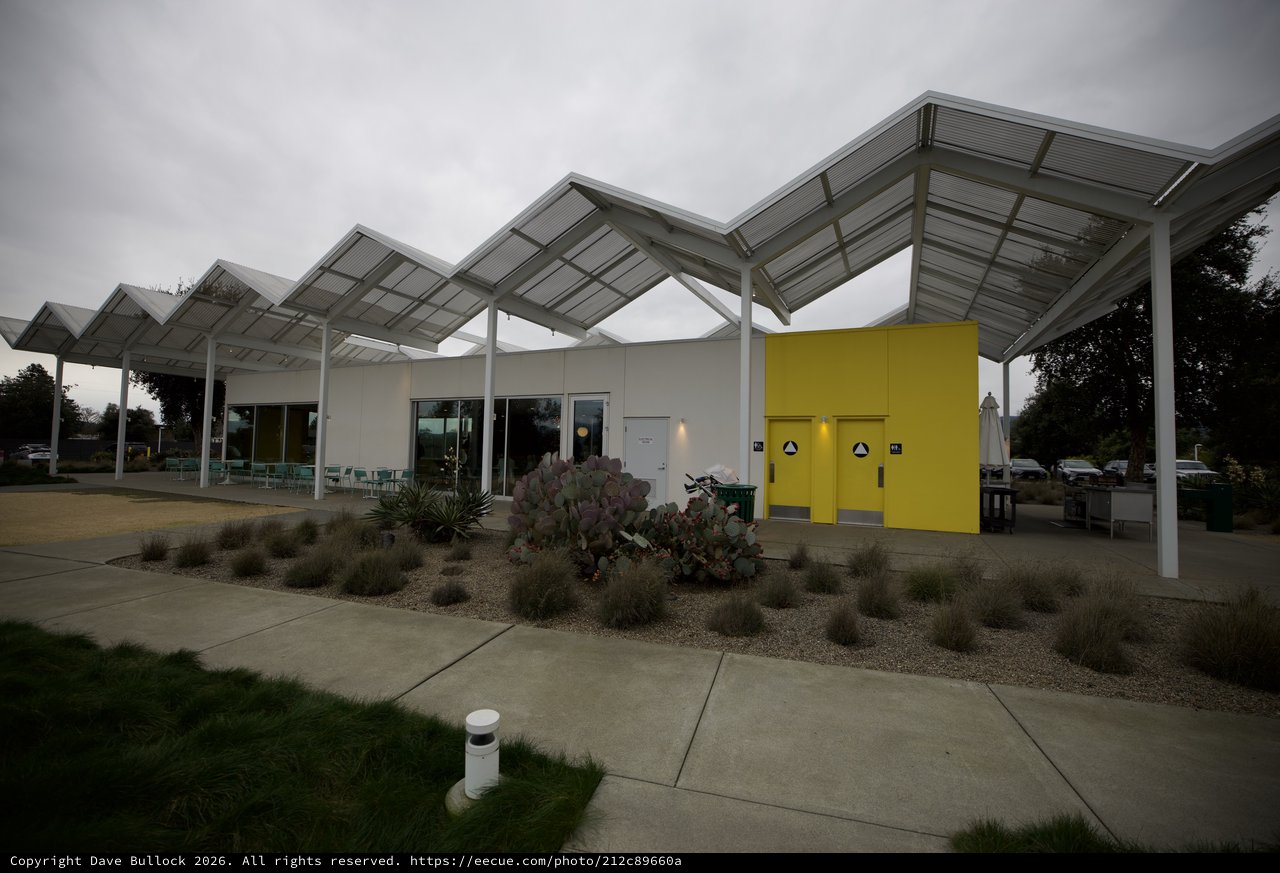 Modern Restaurant with Distinctive Zigzag Solar Canopy