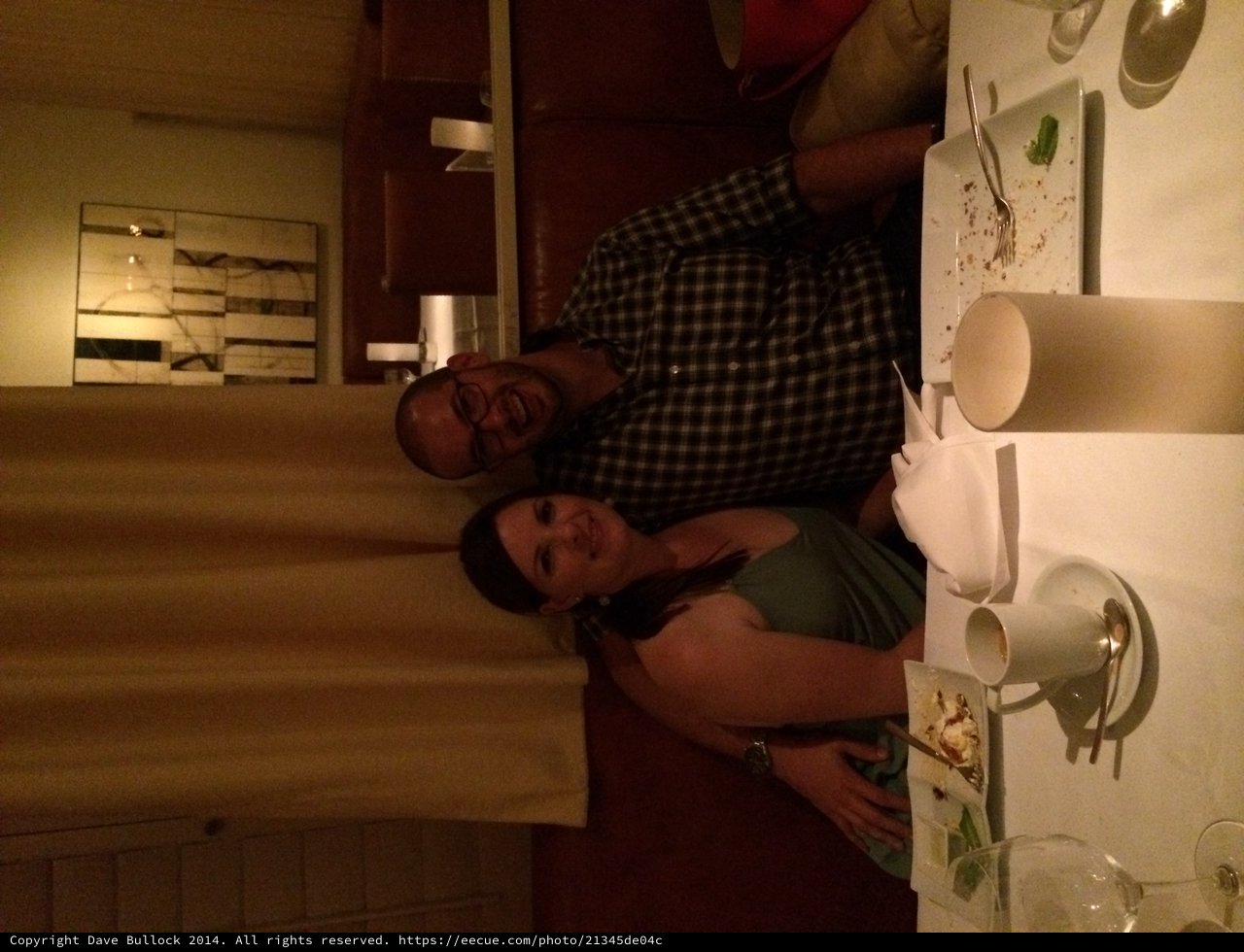 Couple Enjoying a Romantic Candlelit Restaurant Dinner