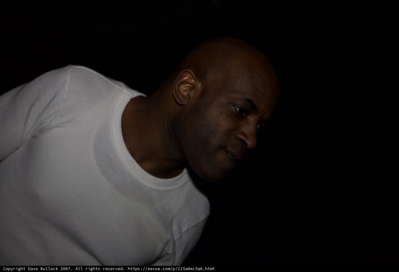 Portrait of a Happy Bald Man in White Undershirt