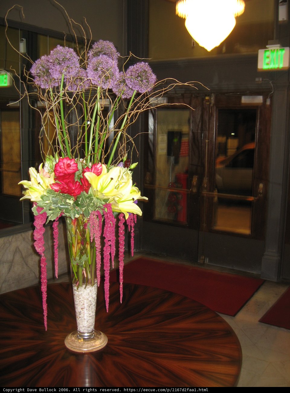 Flower Arrangement on Hardwood Table