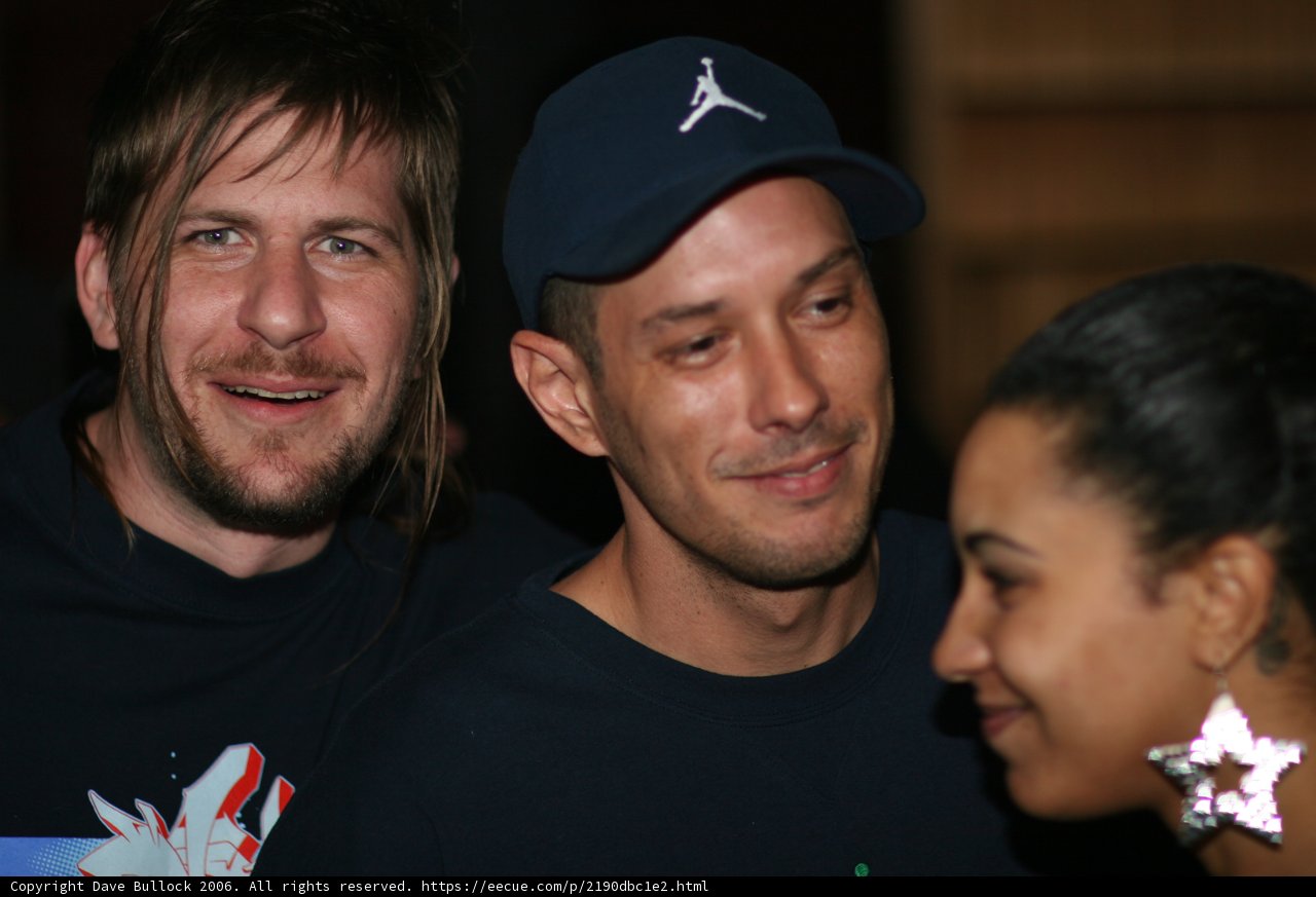 Three Smiling Friends Pose for a Picture
