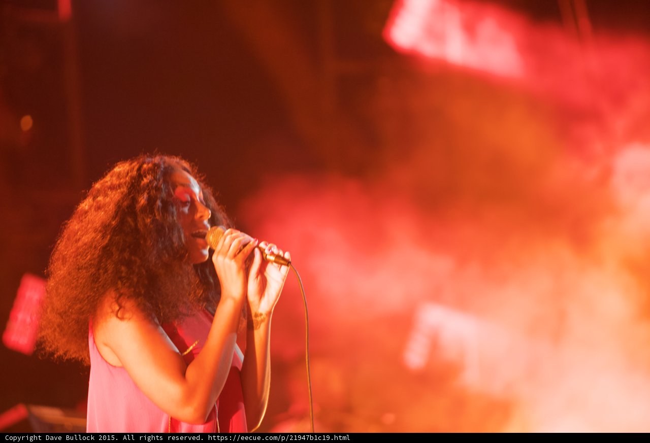 Solange Profile Eyes Closed Singing White Orange Smoke