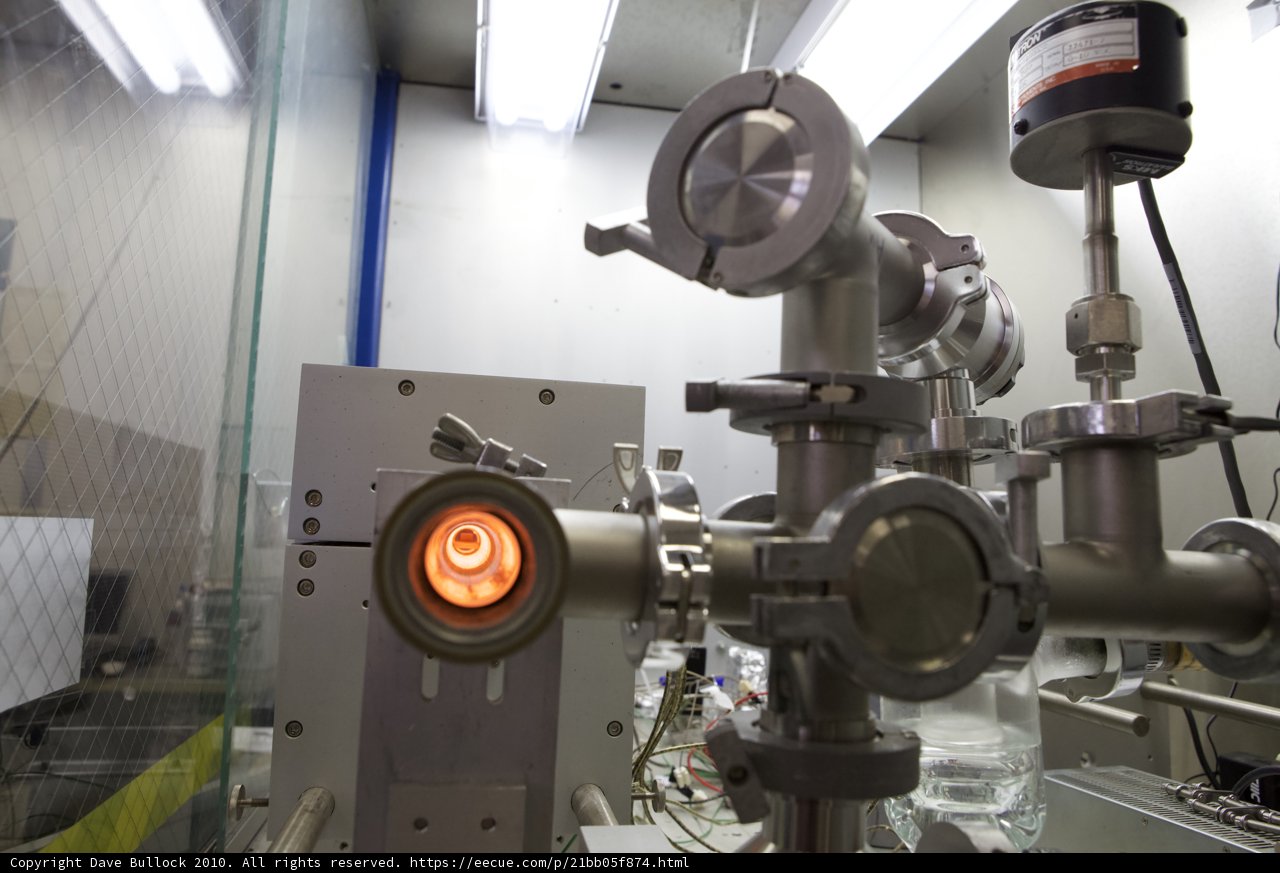 Red-Lit Machine in a Factory