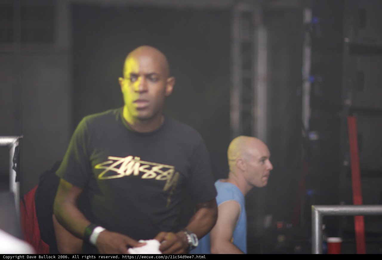 Two Men Take the Stage at Club Performance