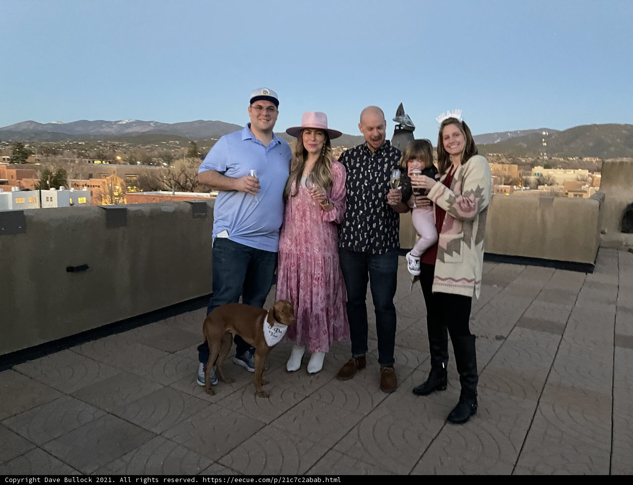 Family and Furry Friend on a Rooftop in Santa Fe