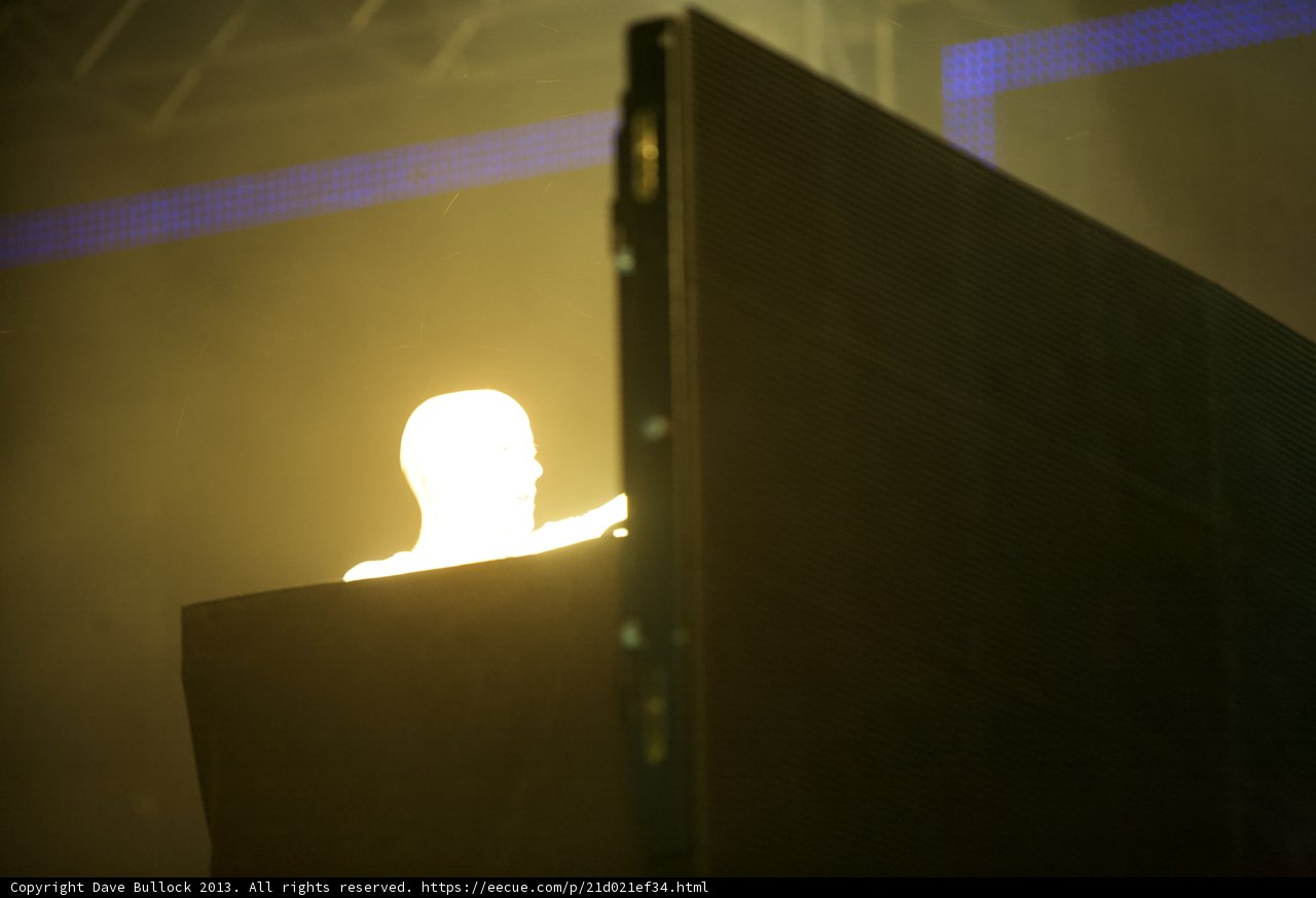 A Silhouetted Figure Against a Mesmerizing LED Screen