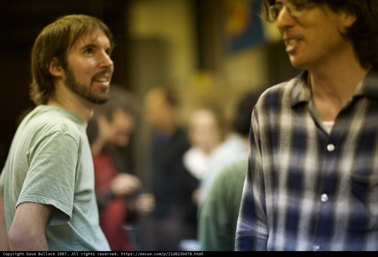 Two Men in Long Sleeve T-Shirts Smiling