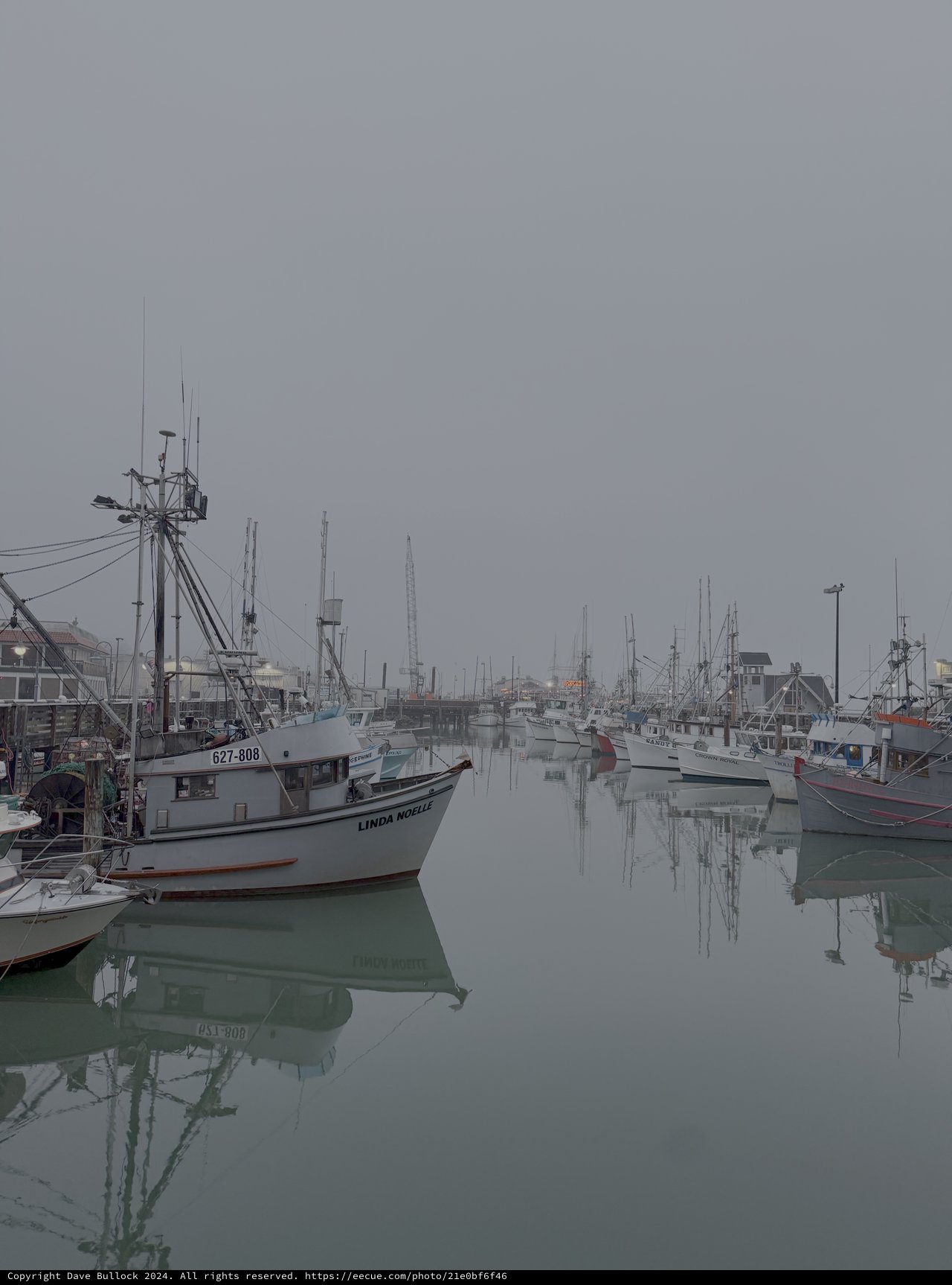 Misty Harbor with Moored Fishing Boats