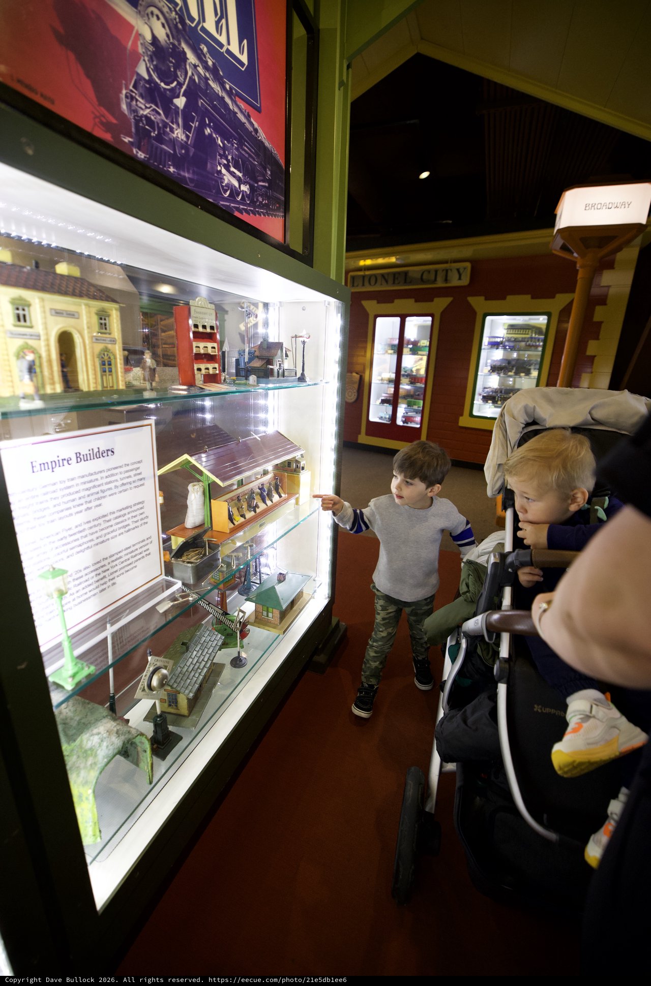 Young Visitors Explore Model Train Display at Museum