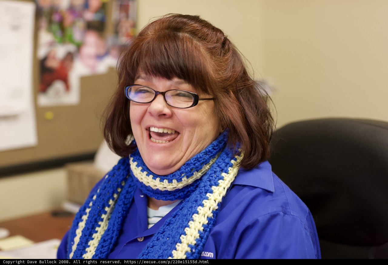 Happy Woman with Glasses and Scarf
