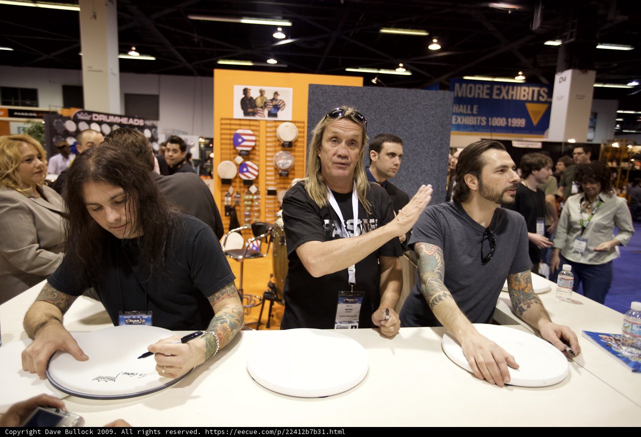 Nicko McBrain showcases tattoos and black shirt at NAMM