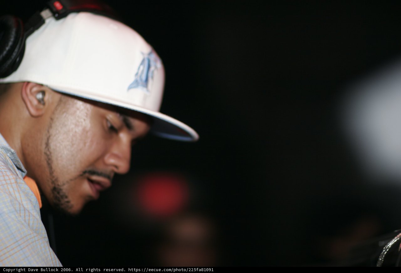 DJ Craze Wears a Hat and Headphones