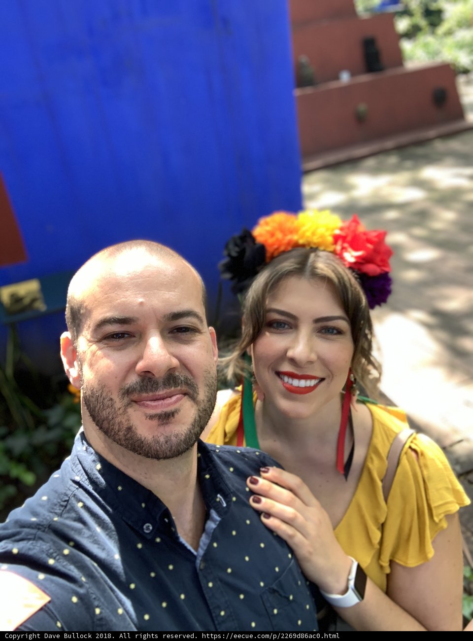 Selfie Time in Front of a Blue Building