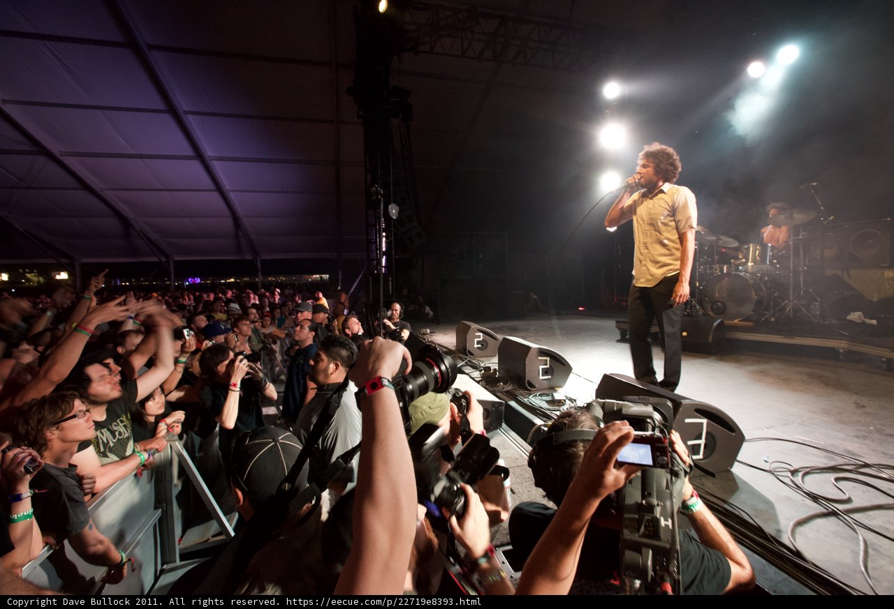 Rocking the Crowd Caption: A musician electrifies the audience with his dynamic performance during Coachella 2011 on Saturday night.