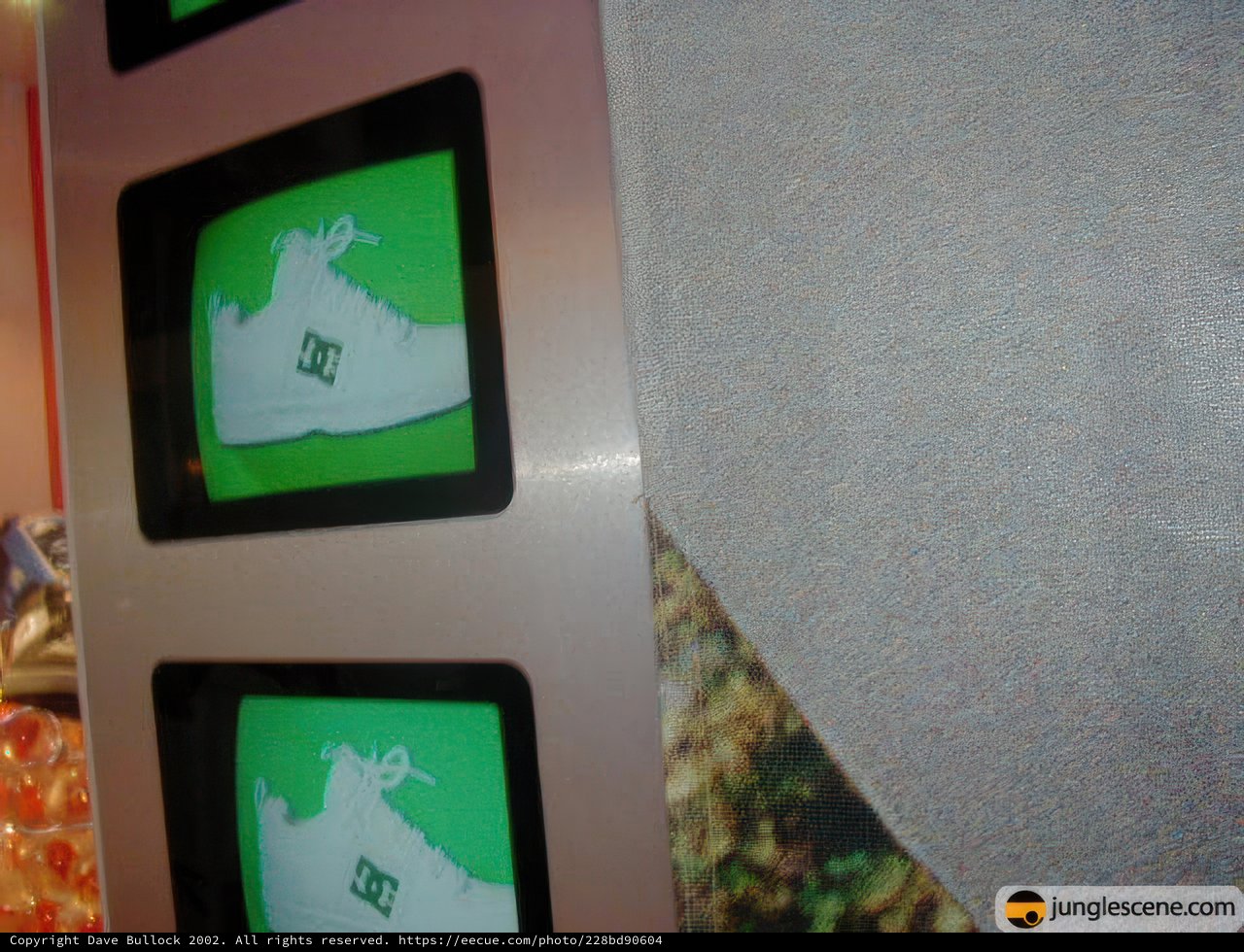 Shoe Display with Green and White Screens