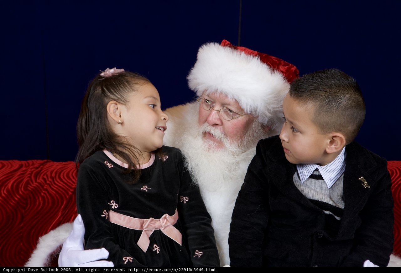 Santa Claus Brings Joy to Two Children