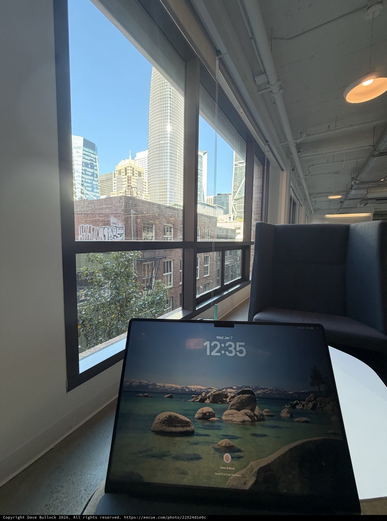 Modern Office Workspace with City Skyline View