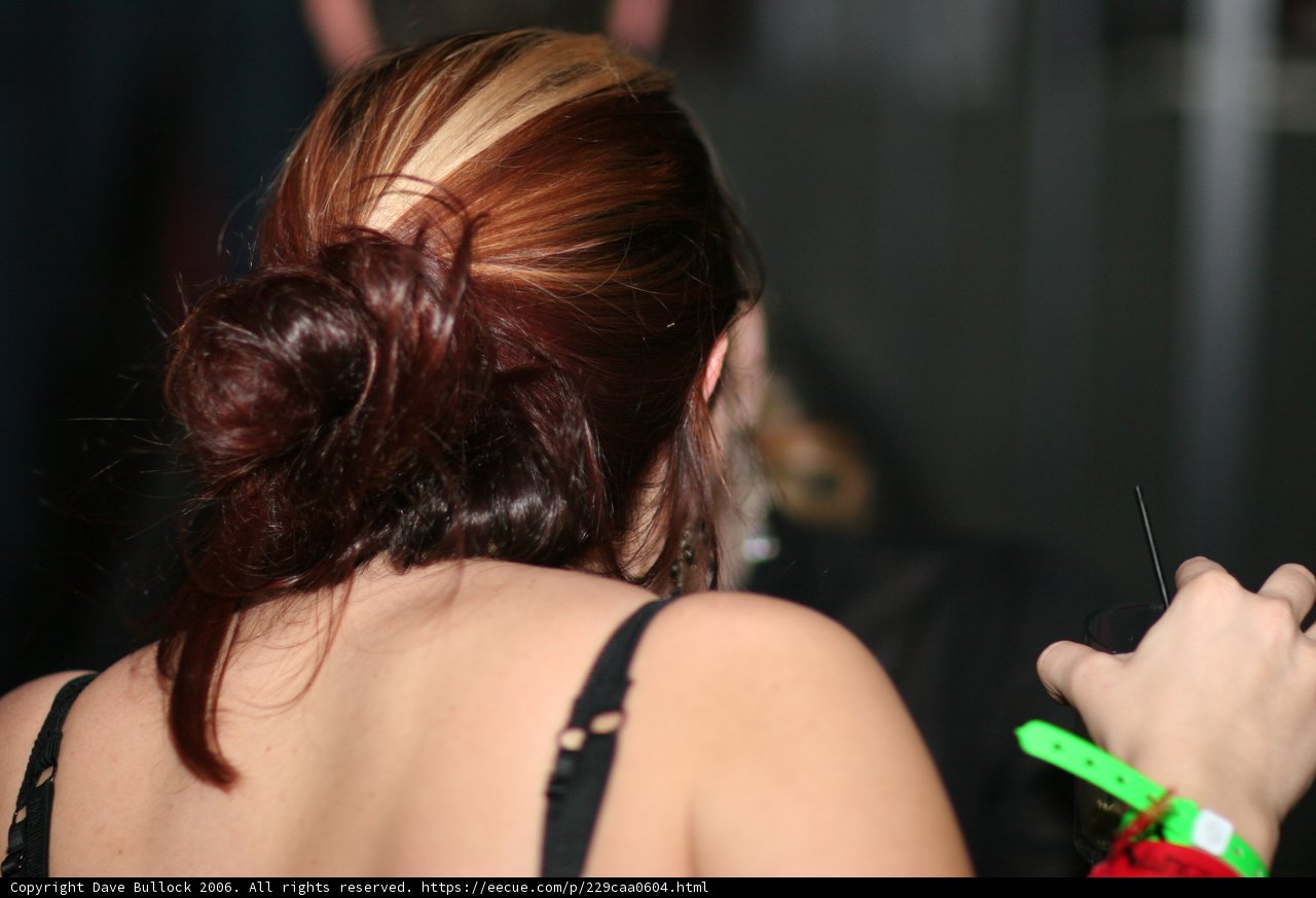 Red-haired Woman Rocking the Bass Rush