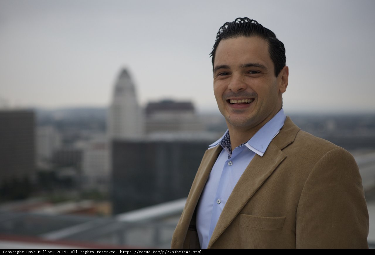 The smiling man in his formal wear