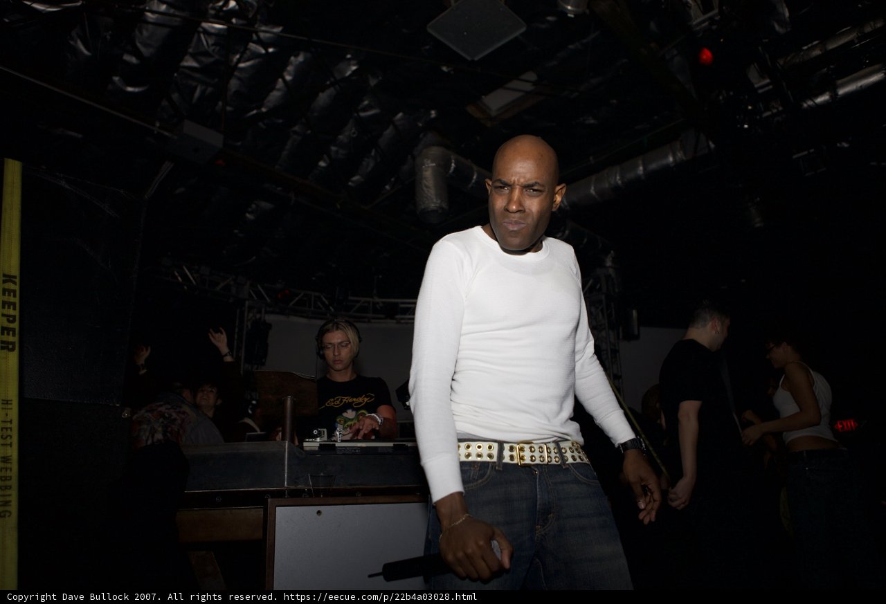 Man in White Shirt at Total Science Club Performance