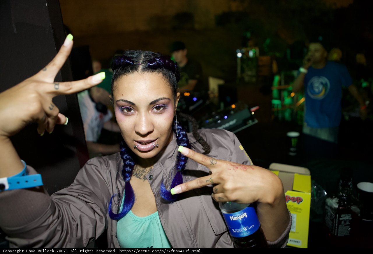 Peace Out with Purple Hair and Green Nails