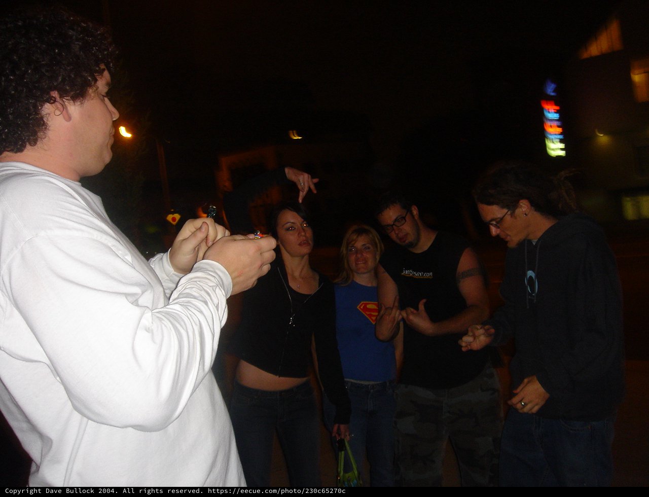 Late Night Street Magic Trick Captivates Small Crowd