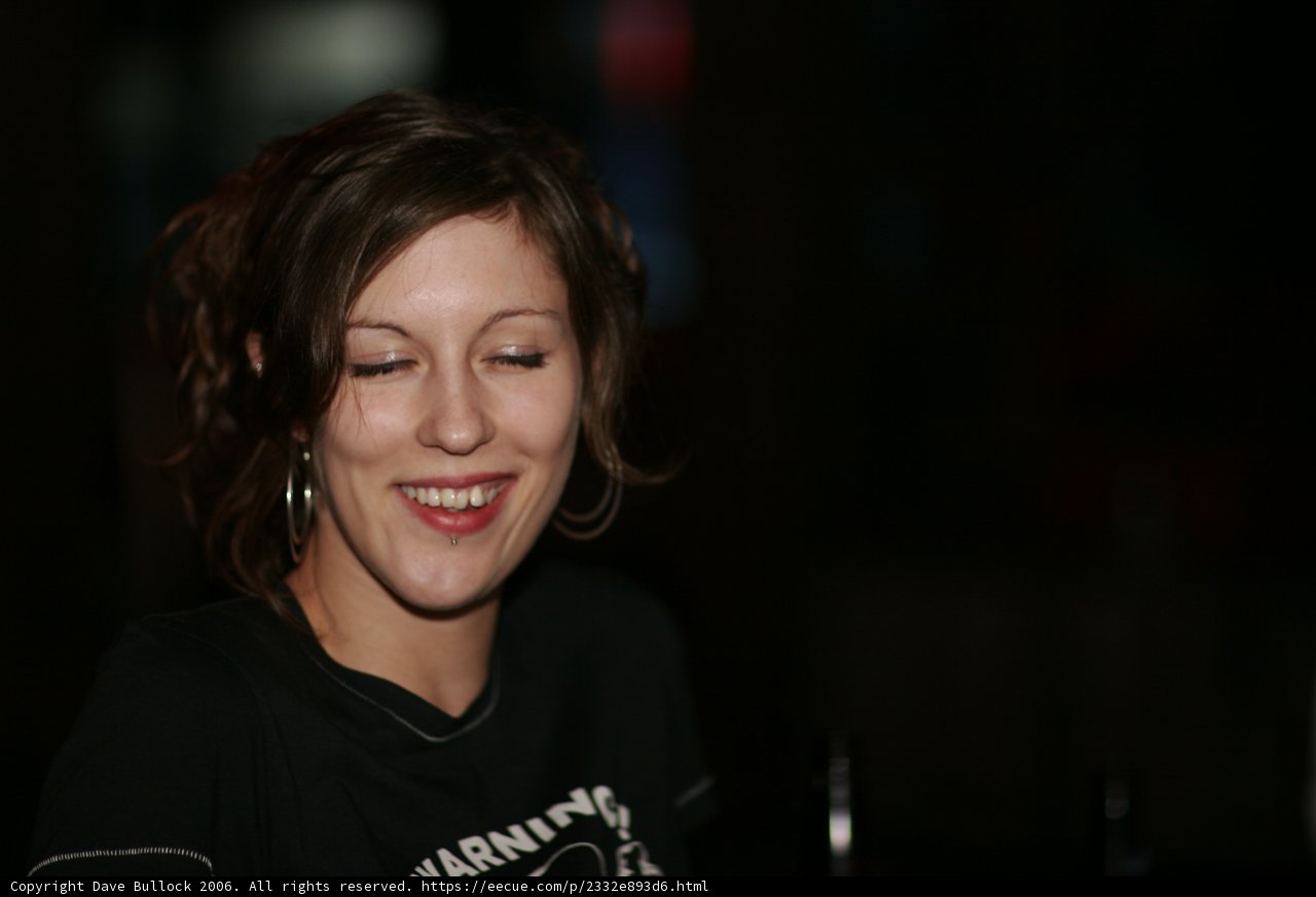 Happy woman chatting on her phone