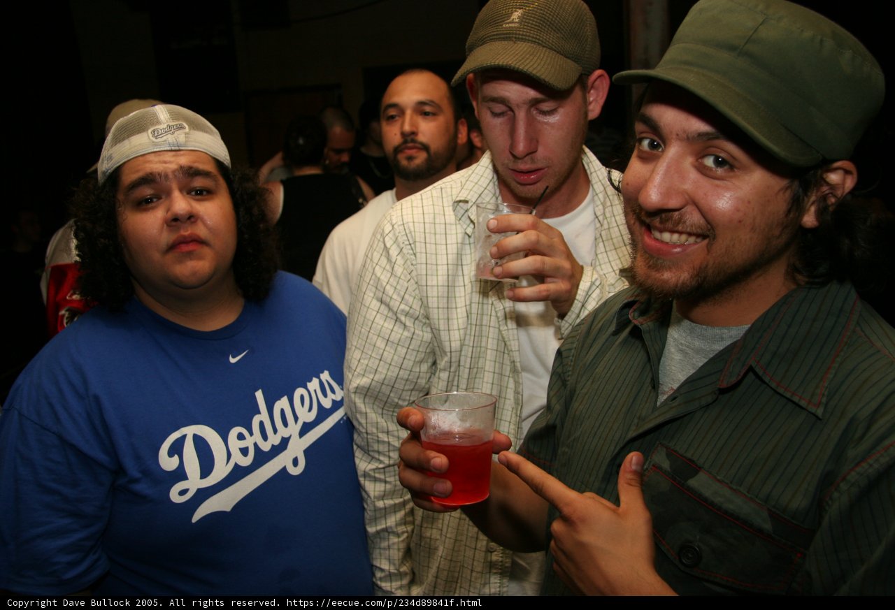Blue Shirt and Two Hats